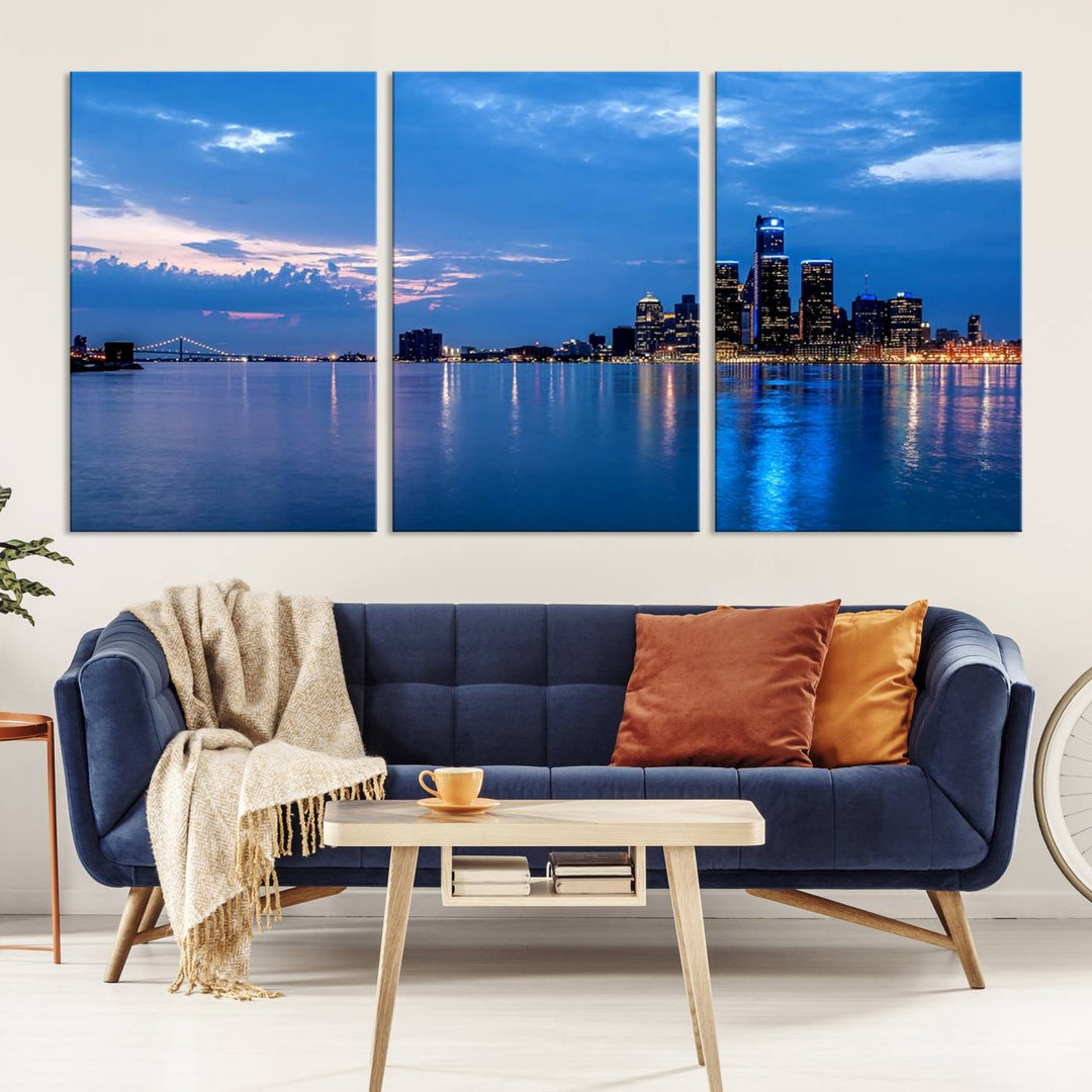 The "Detroit City Lights Night Blue Cloudy Skyline Cityscape View" wall art, displayed on museum-quality canvases, is split into three gallery-wrapped panels.