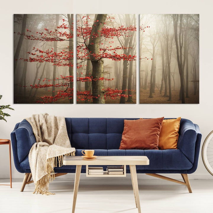 The living room features the Foggy Forest Wall Art, an Autumn Trees Canvas Print that showcases a serene nature scene with foggy woodland decor and a tree adorned in vibrant red leaves.