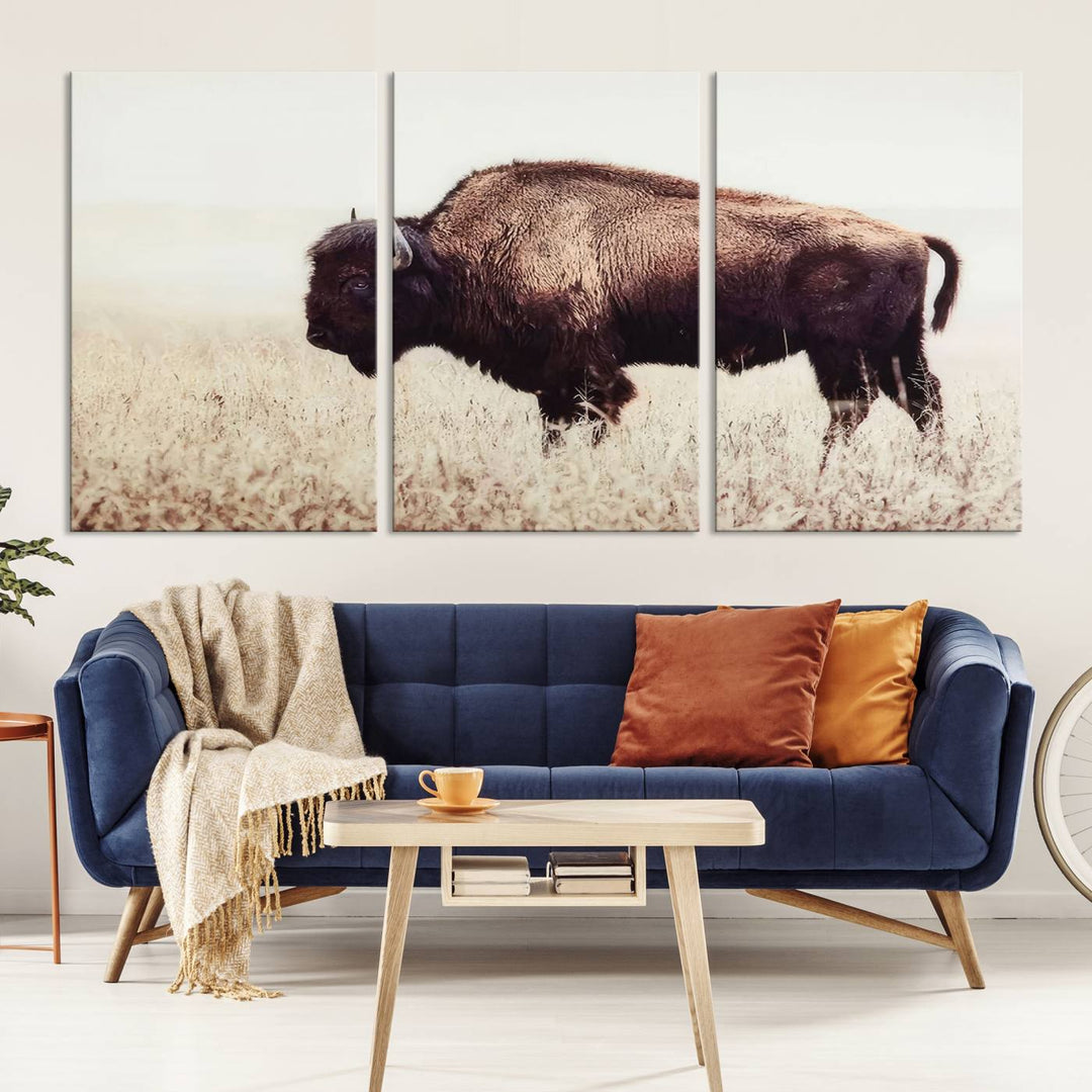 A stylish living room showcases the captivating "Bison in Field" Wall Art Canvas Print as farmhouse decor.