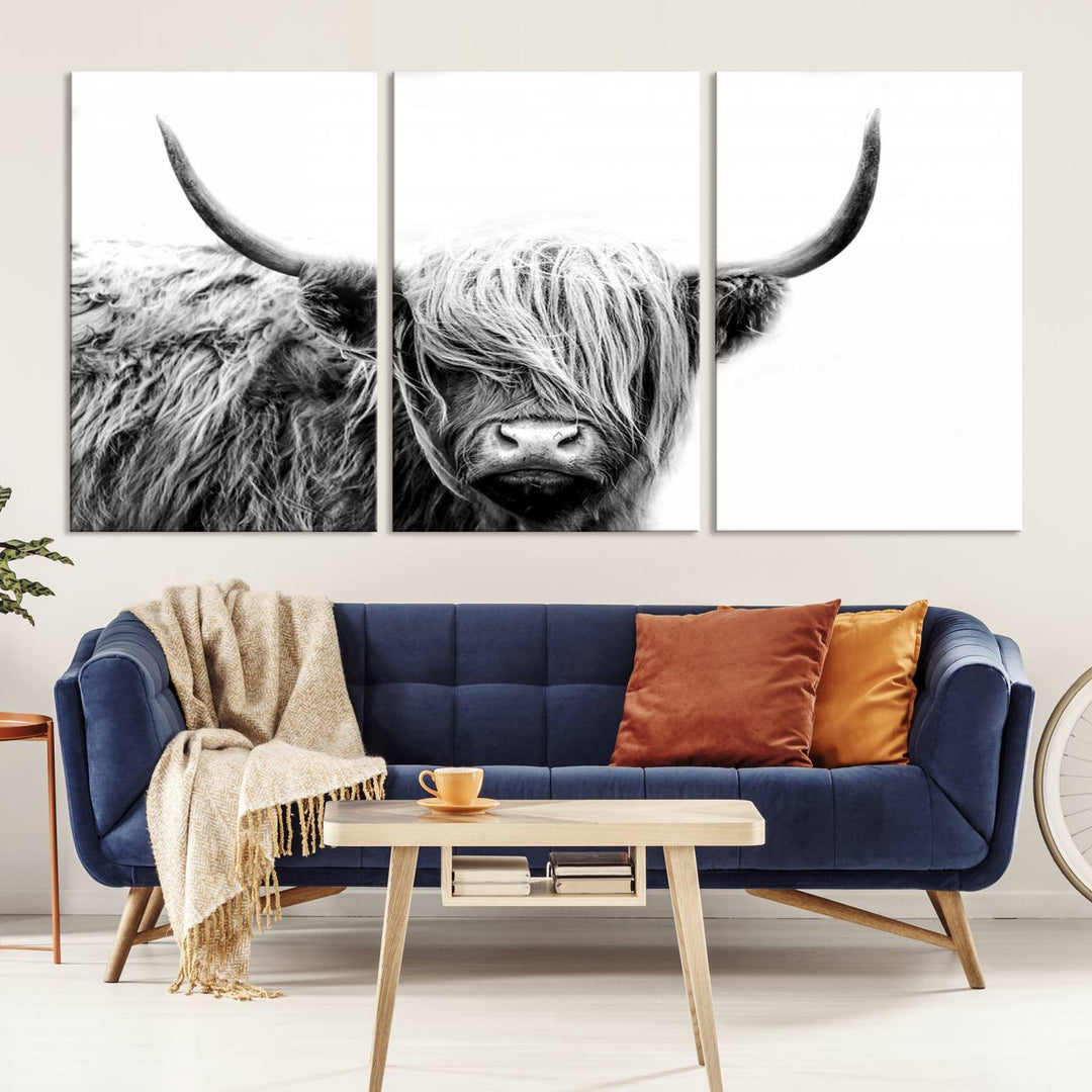 A museum-quality triptych titled "Black White Scottish Highland Cow Cattle Art Print Farmhouse Wall Art Canvas Print" embellishes the dark wall. The canvas is equipped with a UV-protective coating to ensure lasting vibrancy.