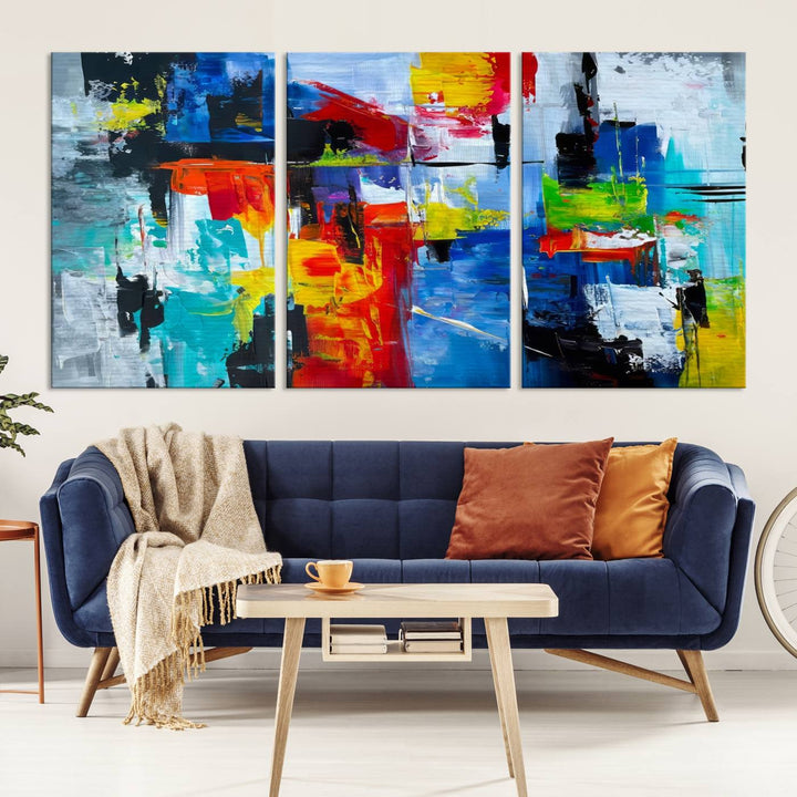 Three Colorful Abstract Wall Art Canvas Prints feature vibrant colors on museum-quality canvas and are finished with a UV-protective coating. Their ready-to-hang design allows for effortless transformation of your space.