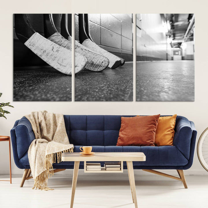 A living room featuring a large Ice Hockey Wall Art Canvas Print on gallery-wrapped canvas.