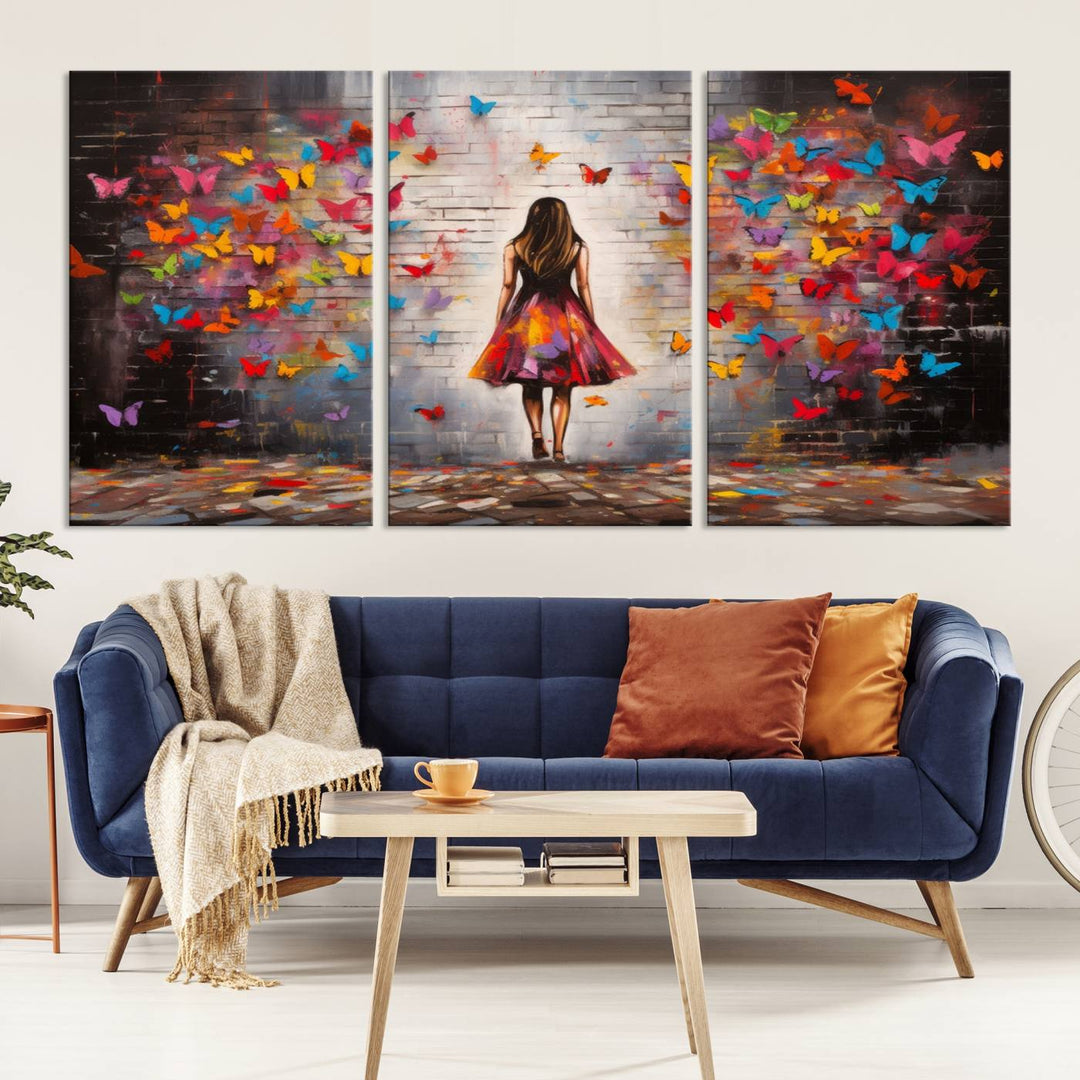 A vibrant artwork titled "Graffiti Wall Art Canvas Print Girl Butterfly Graffiti Abstract Canvas Print" is displayed above the couch. This gallery-wrapped masterpiece, printed on museum-quality canvas, features a UV-protective coating to preserve its vivid beauty.