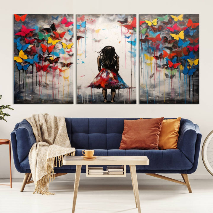 The Girl Butterfly Graffiti Abstract Canvas Print, featuring a vibrant depiction of a girl surrounded by butterflies on museum-quality canvas, is displayed prominently.