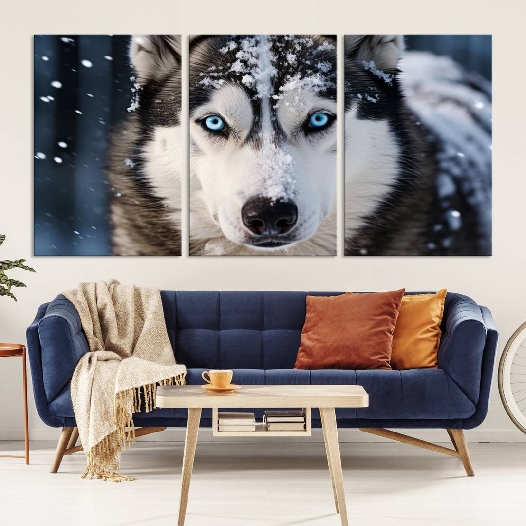 A digital art piece titled "Winter Siberian Husky Wolf Wall Art Canvas Print" showcases a blue-eyed husky blanketed in snow. Printed on high-quality canvas, it is an ideal choice for nature and dog enthusiasts.