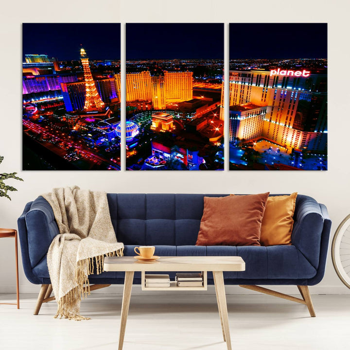 Las Vegas Wall Art Canvas Print showcases a dynamic and luminous cityscape at night with tall buildings and bustling streets. Expertly printed on museum-quality canvas, this gallery-wrapped artwork is enhanced with a UV-protective coating to ensure lasting brilliance.