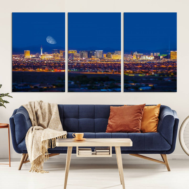 The Las Vegas Wall Art Canvas Print, depicting a city skyline at night, enhances a modern living room with its museum-quality canvas. This triptych comes ready to hang and boasts a UV-protective coating for lasting brilliance.