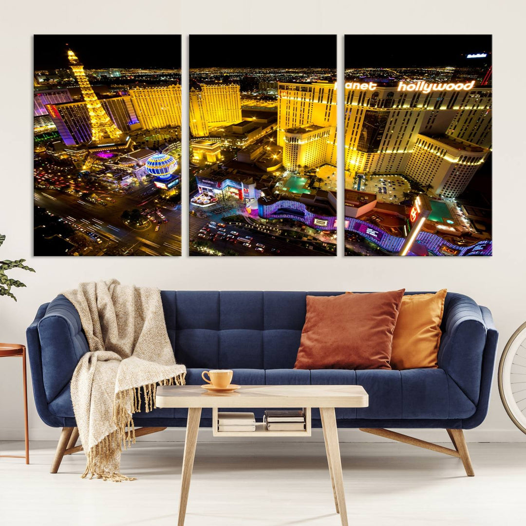 The modern living room features a Las Vegas Wall Art Canvas Print, a museum-quality triptych showcasing a vibrant cityscape with neon lights.