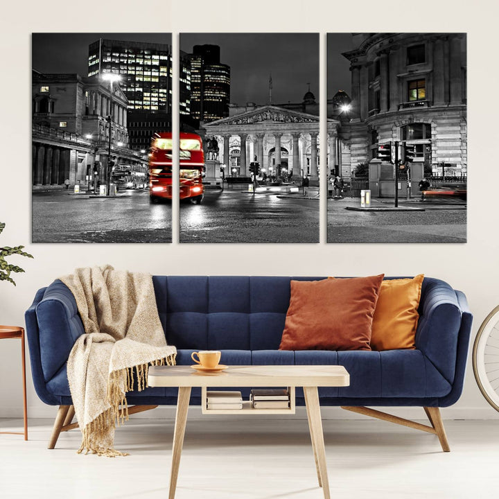 The London Night Red Bus Wall Art Canvas Print features a black and white cityscape with a moving red double-decker bus, crafted on museum-quality canvas with a UV-protective coating. This ready-to-hang artwork is designed to stand out and enhance any space.