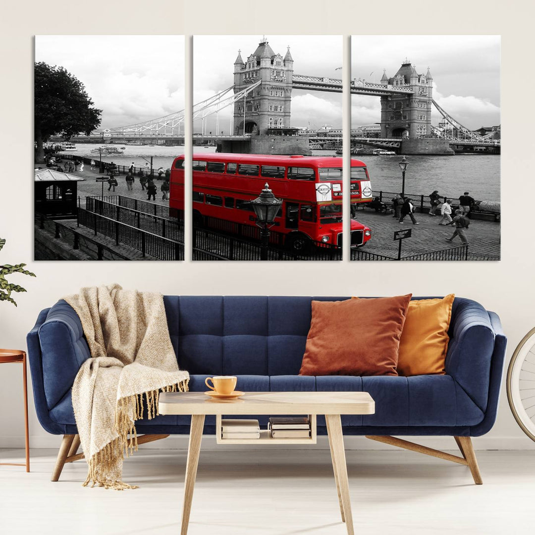 The London Red Bus and Bridge Wall Art Canvas Print showcases a red London bus in front of Tower Bridge, beautifully presented as a gallery-wrapped canvas. This striking image is divided into three panels, delivering a museum-quality display that's ready to hang.