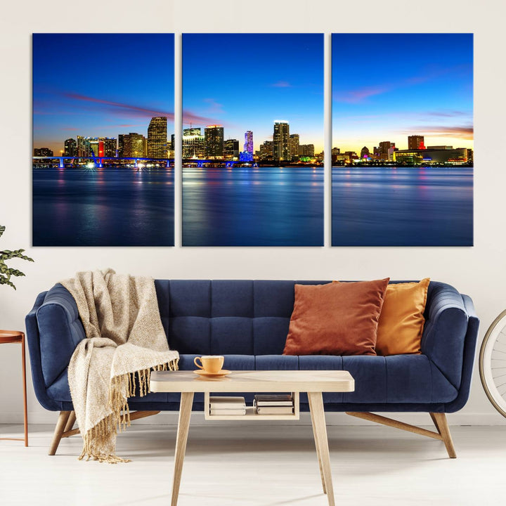 The living room features a Miami City Wall Art Canvas Print—a gallery-wrapped triptych displaying a city skyline at dusk, adding museum-quality elegance to the space.