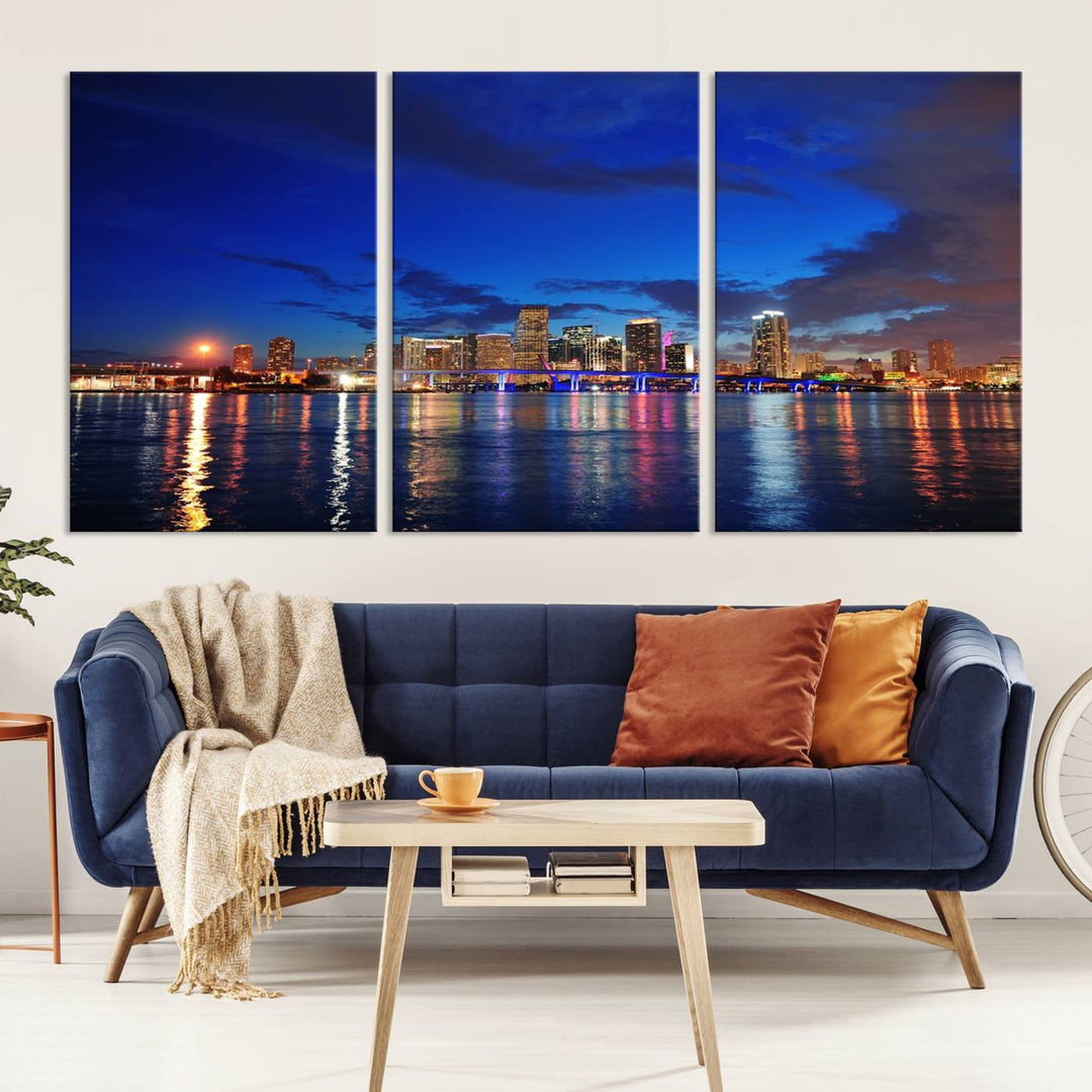 A large Miami City View Wall Art Canvas Print featuring the Miami City Skyline Panorama at night is displayed above the dresser.