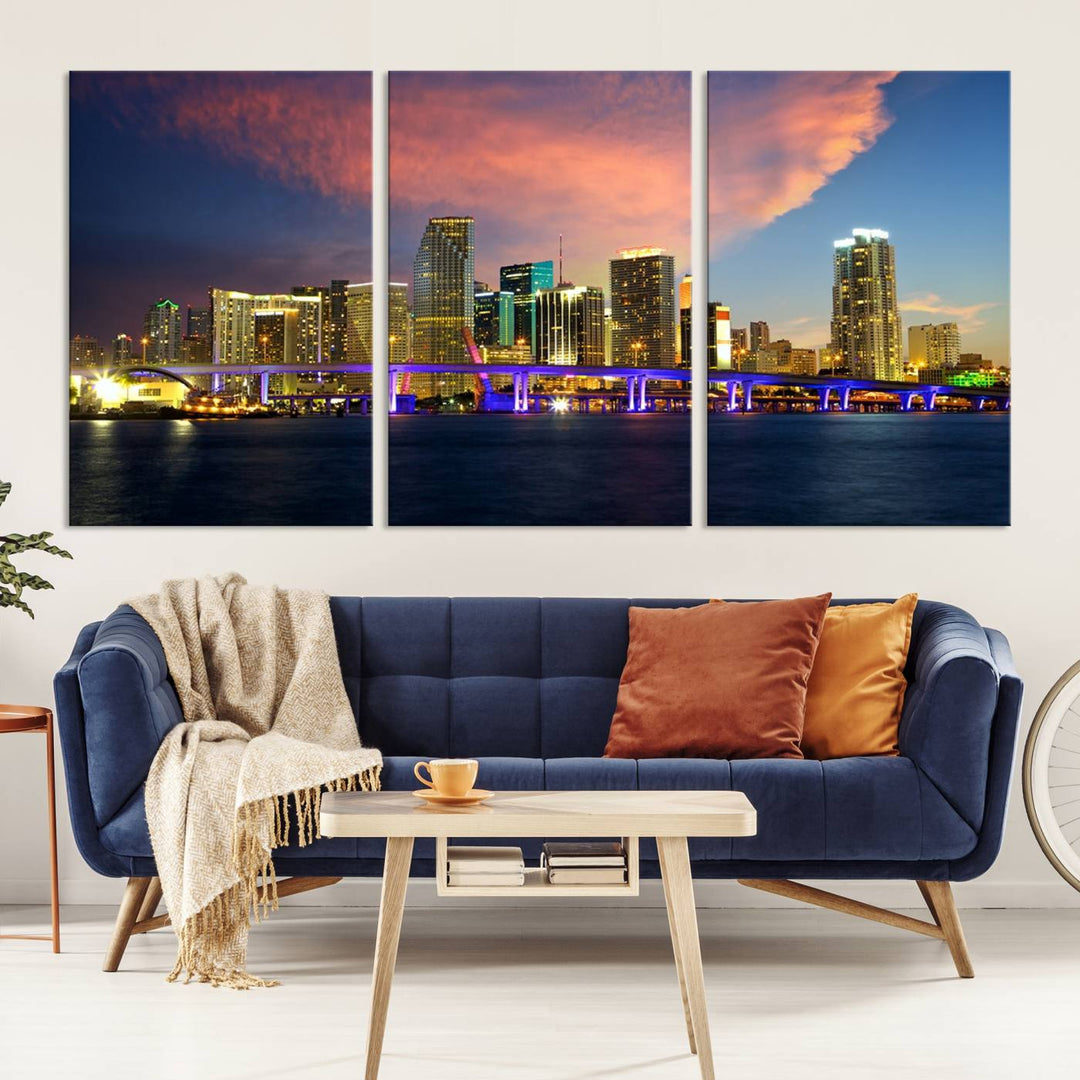 The modern living room is enhanced by the "Miami City Wall Art Canvas Print," a stunning triptych portraying a city skyline at sunset. These canvases are gallery wrapped and made from museum-quality materials, featuring a UV-protective coating to ensure lasting vibrancy.