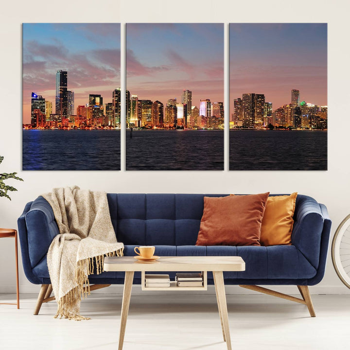 The living room features a gallery-wrapped triptych of the Miami City Wall Art Canvas Print above the sofa.