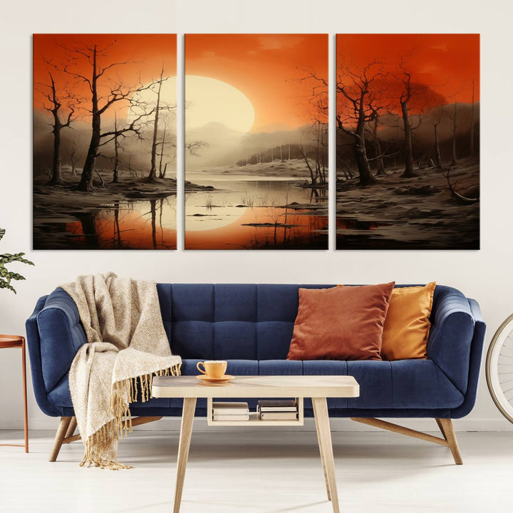 The "Abstract Watercolor Trees and Sunset on Lake Wall Art" is a triptych masterpiece, showcasing an orange-hued landscape of barren trees and a large sun. Displayed on museum-quality canvases with UV-protective coating, it creates a striking visual element in any space.