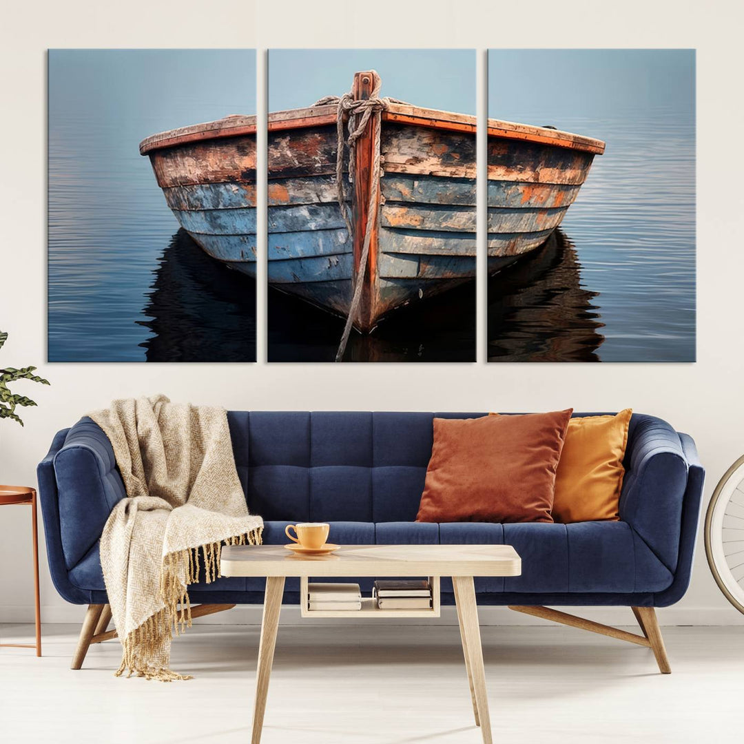 A stunning Vintage Boat canvas print features a three-panel wall art of an old wooden boat on calm water, crafted on premium canvas for a gallery-quality finish.