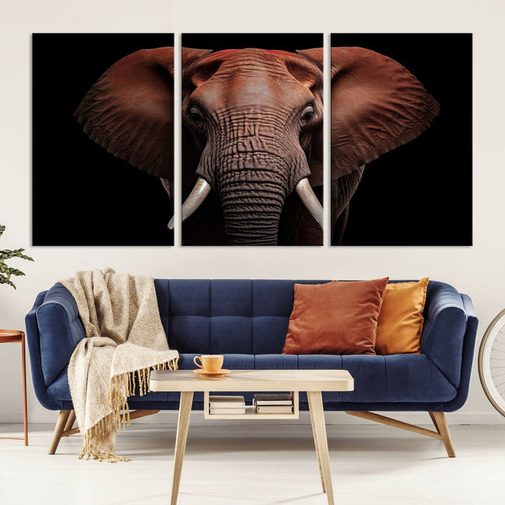 A stunning triptych titled "Wild Elephant Wall Art Canvas Print" beautifully enhances the wall above a contemporary living room. This Africa Savannah Wild Animal Wall Decor Print is of museum-quality, complete with a UV-protective coating to ensure its vibrancy and beauty are preserved for years.