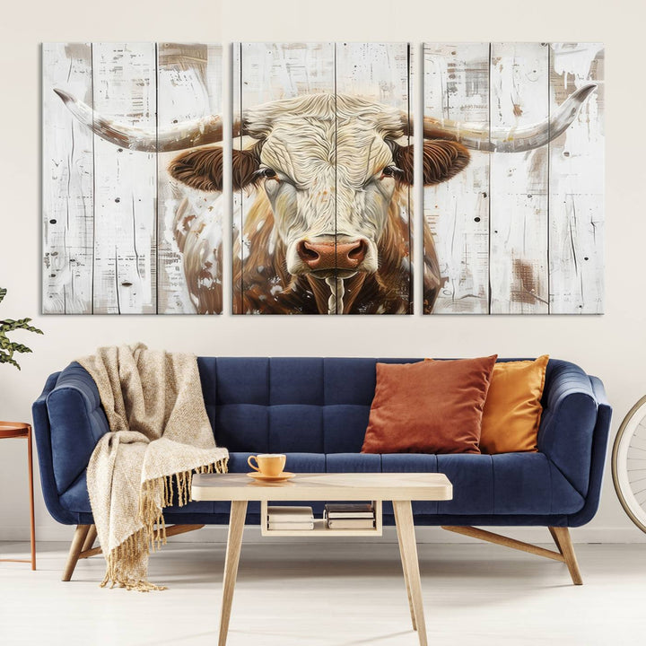 The dimly lit room is enhanced with Western charm by the Rustic Longhorn Bull Wall Art Canvas Set—Western-Inspired Farmhouse Décor, elegantly displayed on the wall.