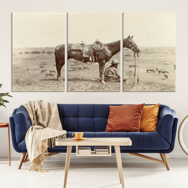 The "Serene Cowboy and Horse Resting on the Prairie" canvas print beautifully captures the essence of the American West, featuring a vintage cowboy resting under his horse in a grassy field with grazing cattle. This ready-to-hang western wall art adds a touch of nostalgia to any space.