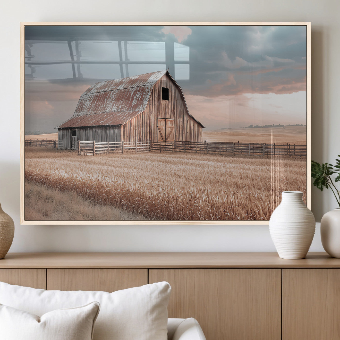Framed canvas of a rustic barn in a golden wheat field under soft skies, ideal for vintage farmhouse or country-style wall decor.