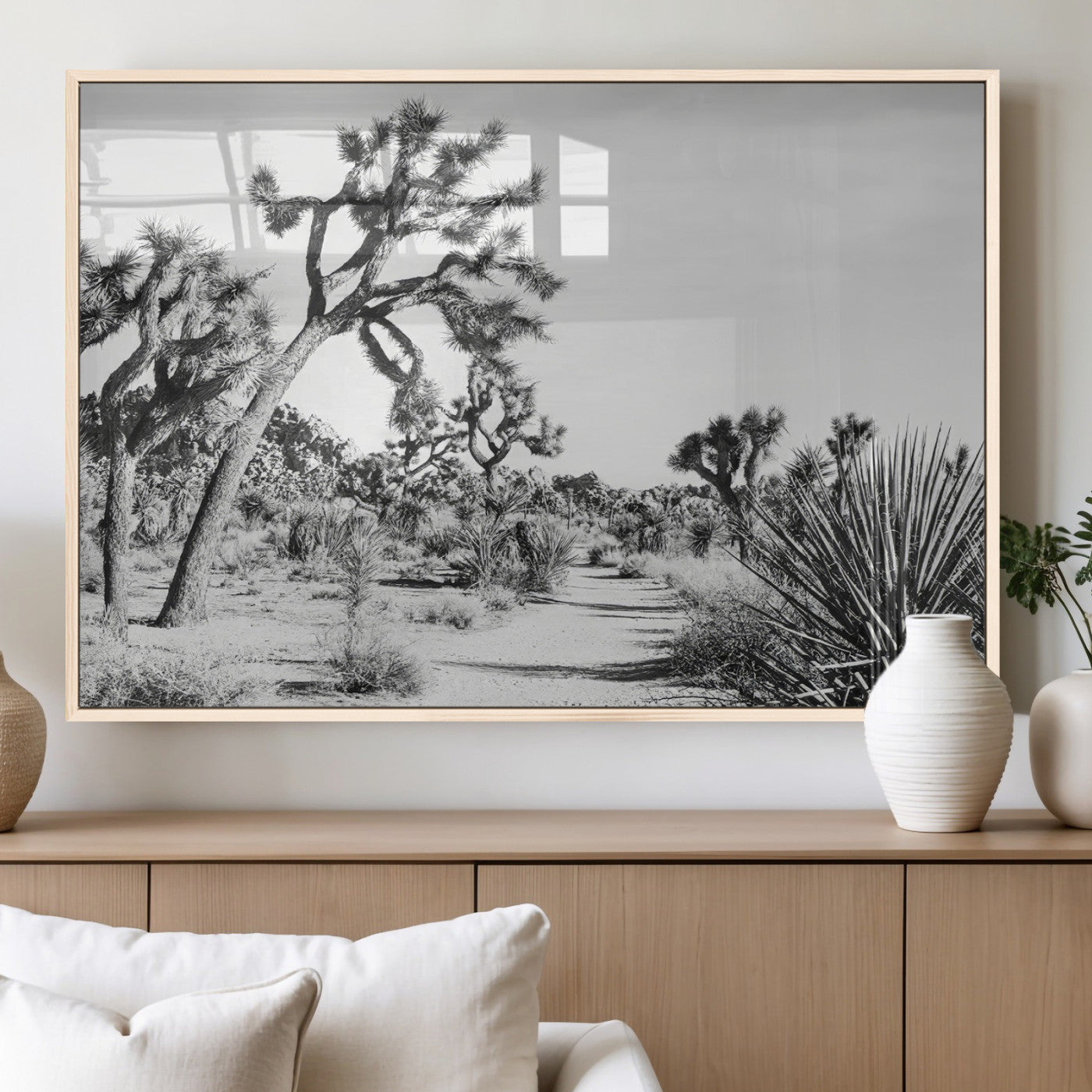 Canvas of a Joshua Tree forest in black and white tones, featuring a desert path and spiky vegetation, ideal for minimalist or rustic decor.