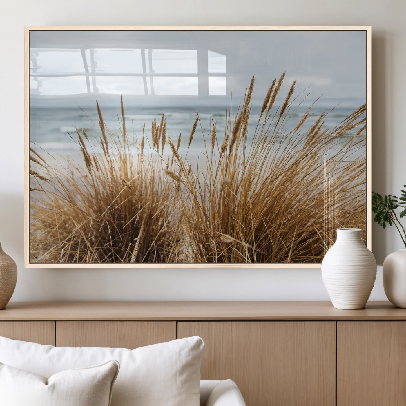Canvas of golden beach grass swaying by the ocean under a soft cloudy sky, perfect for neutral-toned or coastal minimalist decor.