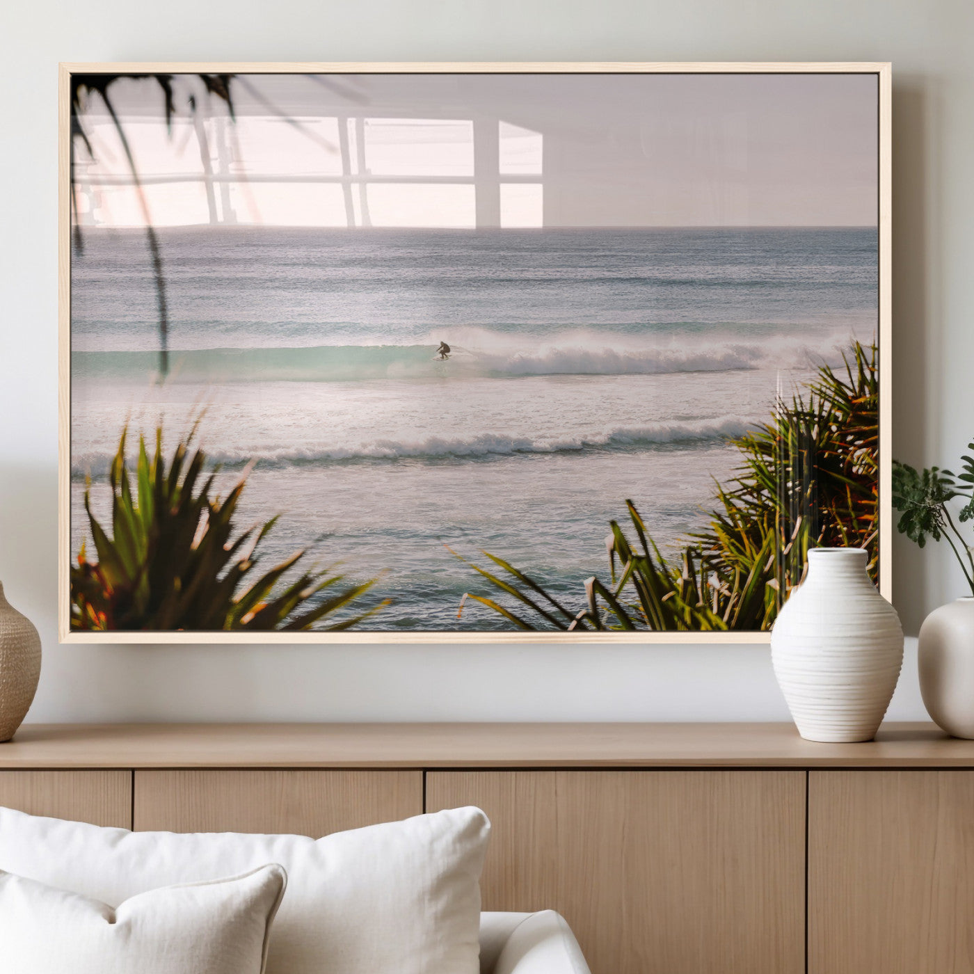 Canvas of a lone surfer riding a pastel wave at sunrise, perfect for tropical or coastal-themed spaces with a relaxed, airy vibe.