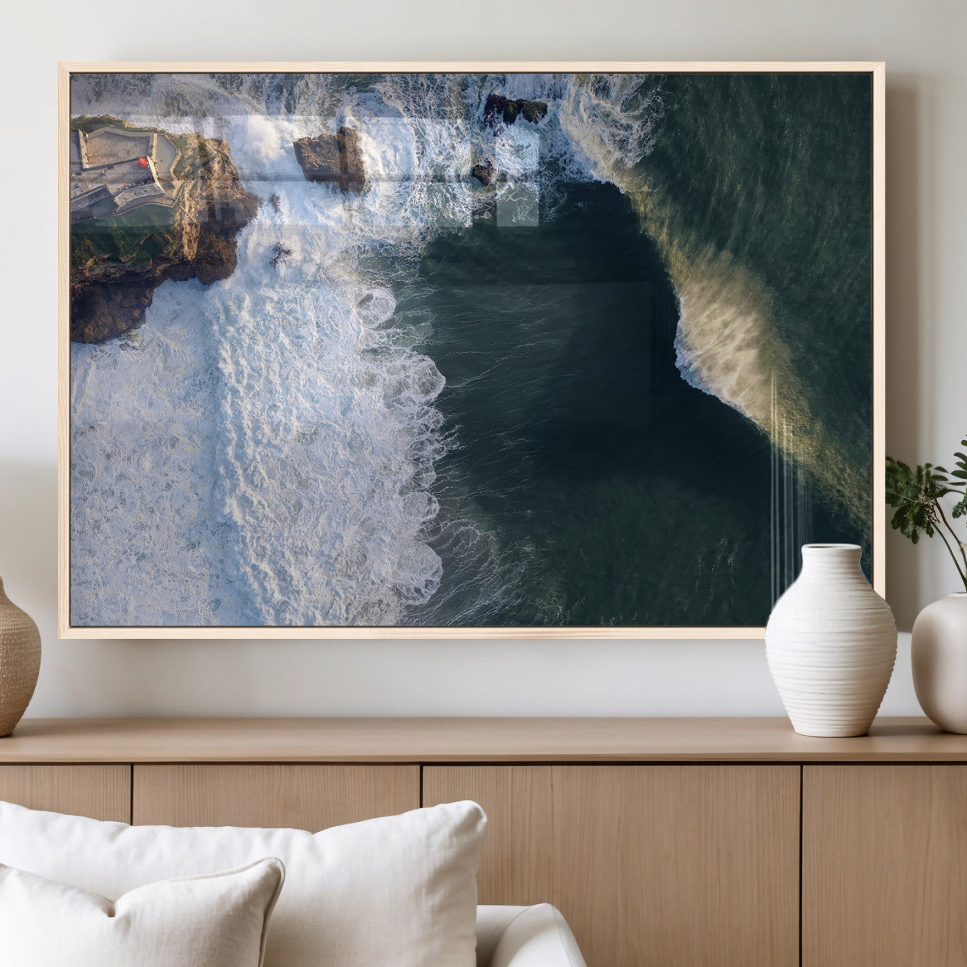 Canvas showing an aerial view of crashing waves along the Nazaré coastline, perfect for dramatic coastal or ocean-themed home decor.