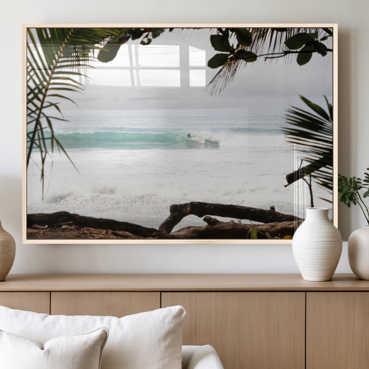 Tropical beach view with palm trees and surfer riding a wave, perfect for boho or coastal-inspired interior wall decor.