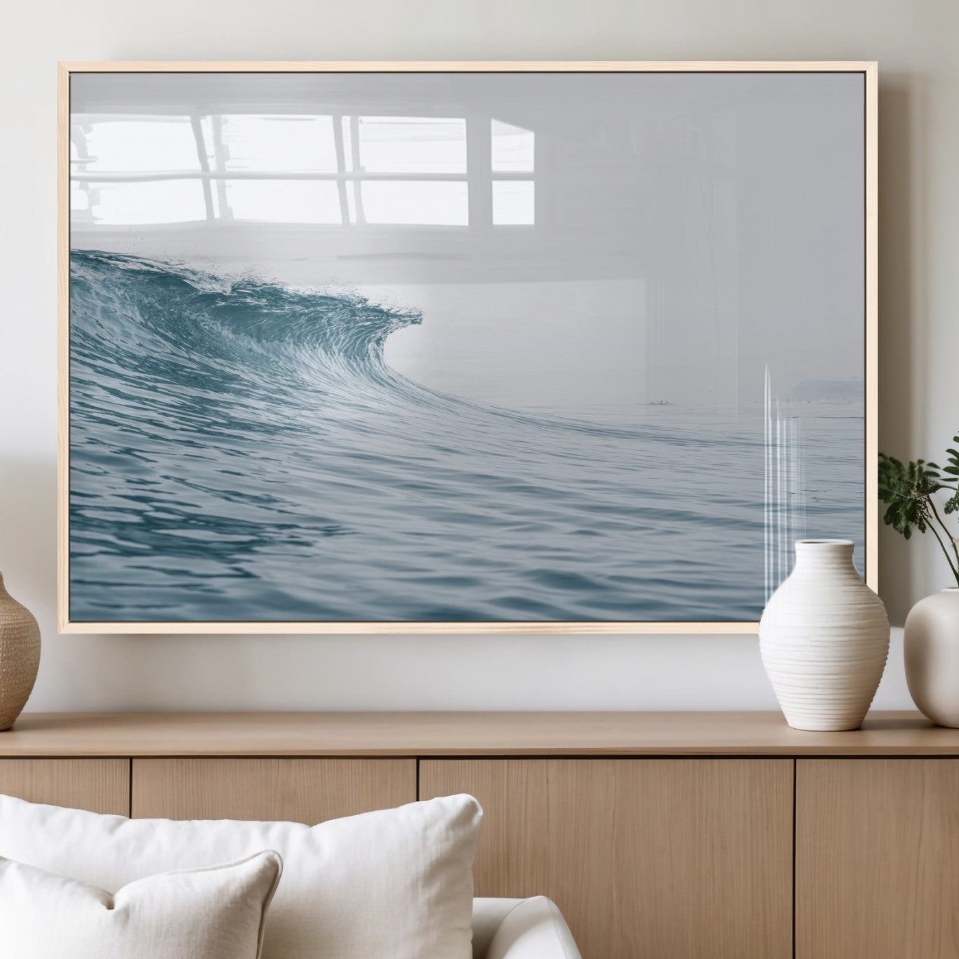 A single ocean wave curling in soft blue tones under a misty sky, ideal for coastal or minimalist home wall decor.