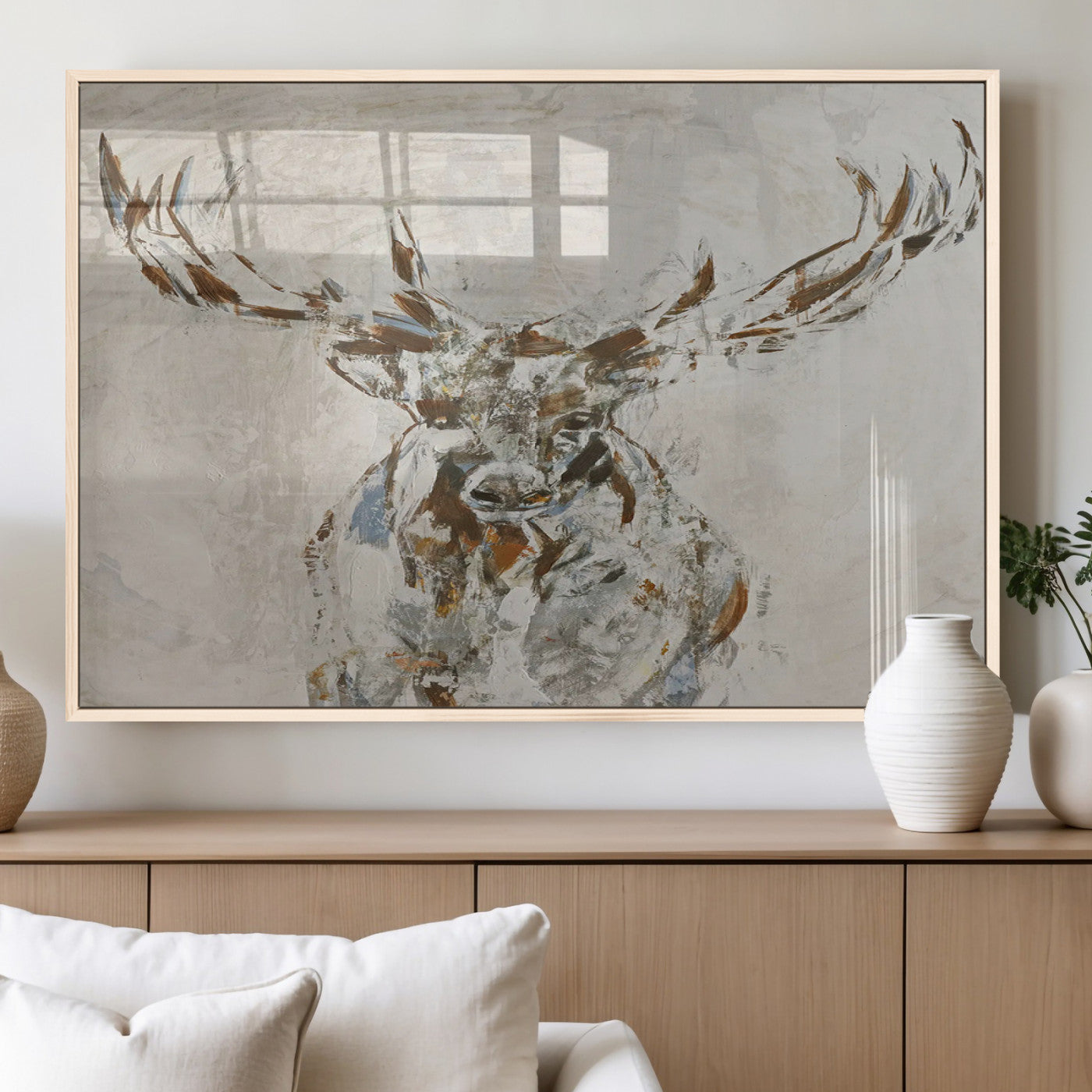 Abstract painting of a deer with antlers in neutral earth tones, ideal for modern rustic or lodge-style living room wall decor.