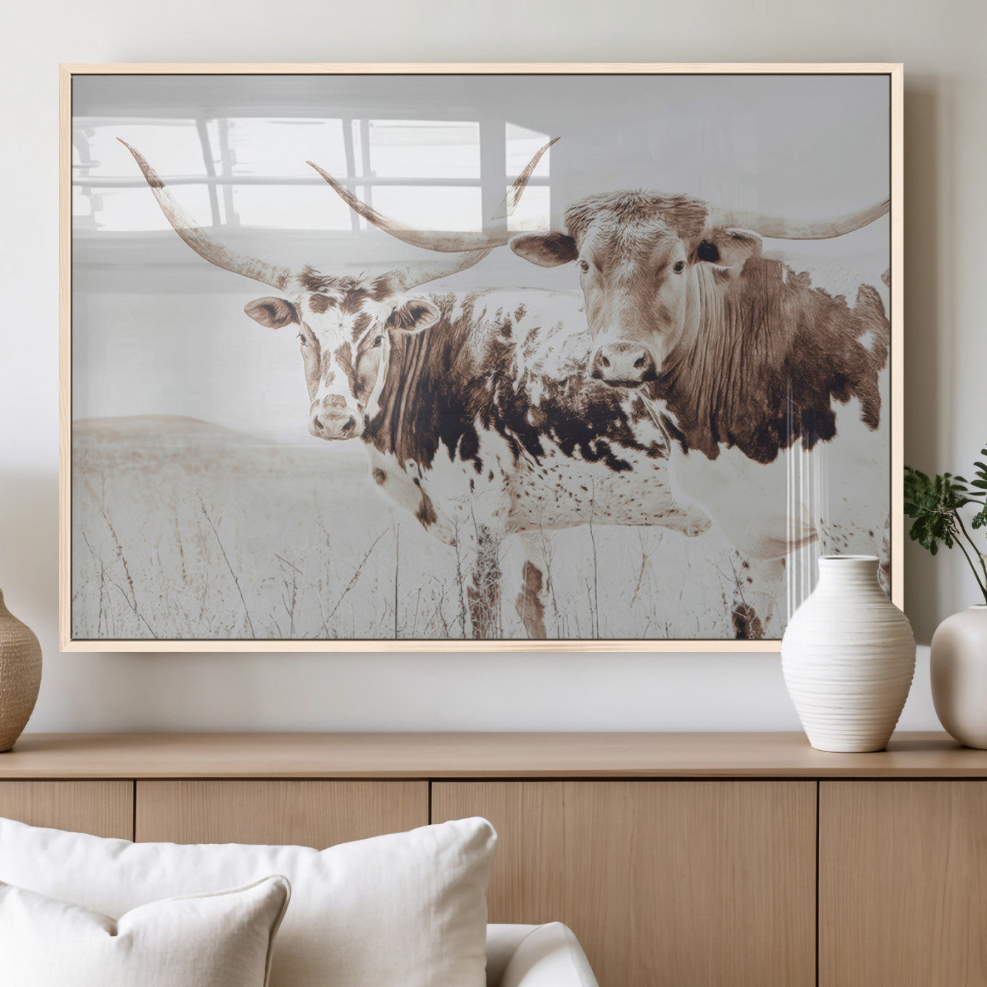 Two longhorn cows standing in a sepia-toned pasture with soft light, ideal for rustic or farmhouse-themed neutral wall decor.