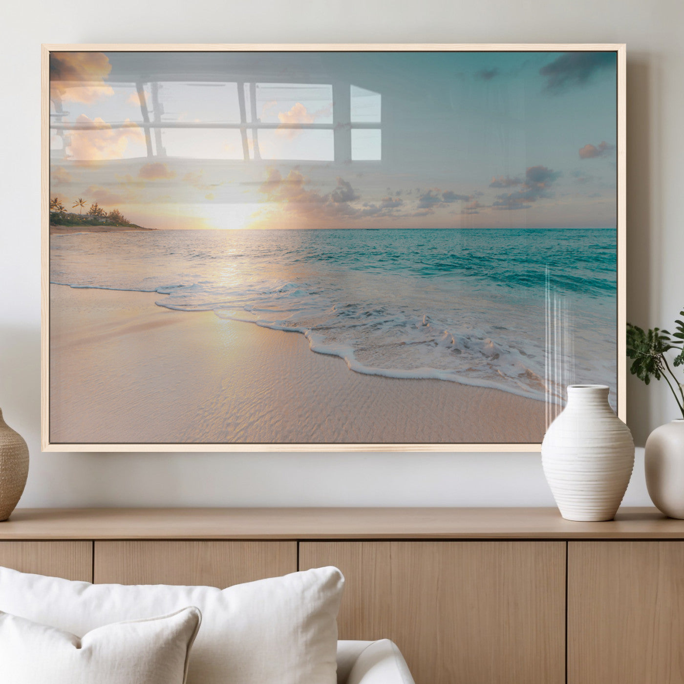 Golden sunset over a tropical beach with gentle ocean waves and soft white sand, creating a peaceful and relaxing coastal scene.