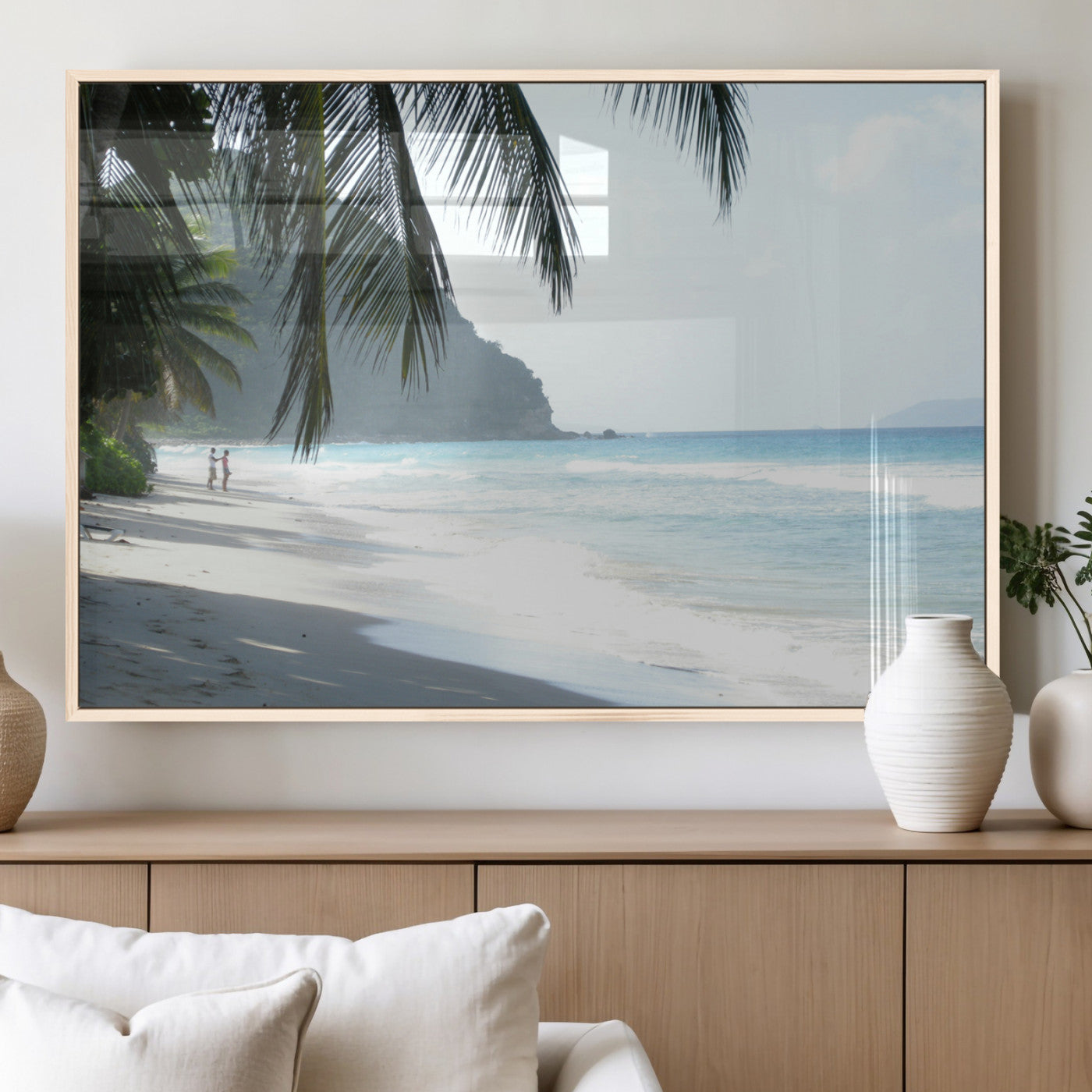 Tropical beach with palm tree shadows, white sand, and turquoise ocean waves, creating a serene and relaxing island escape atmosphere.