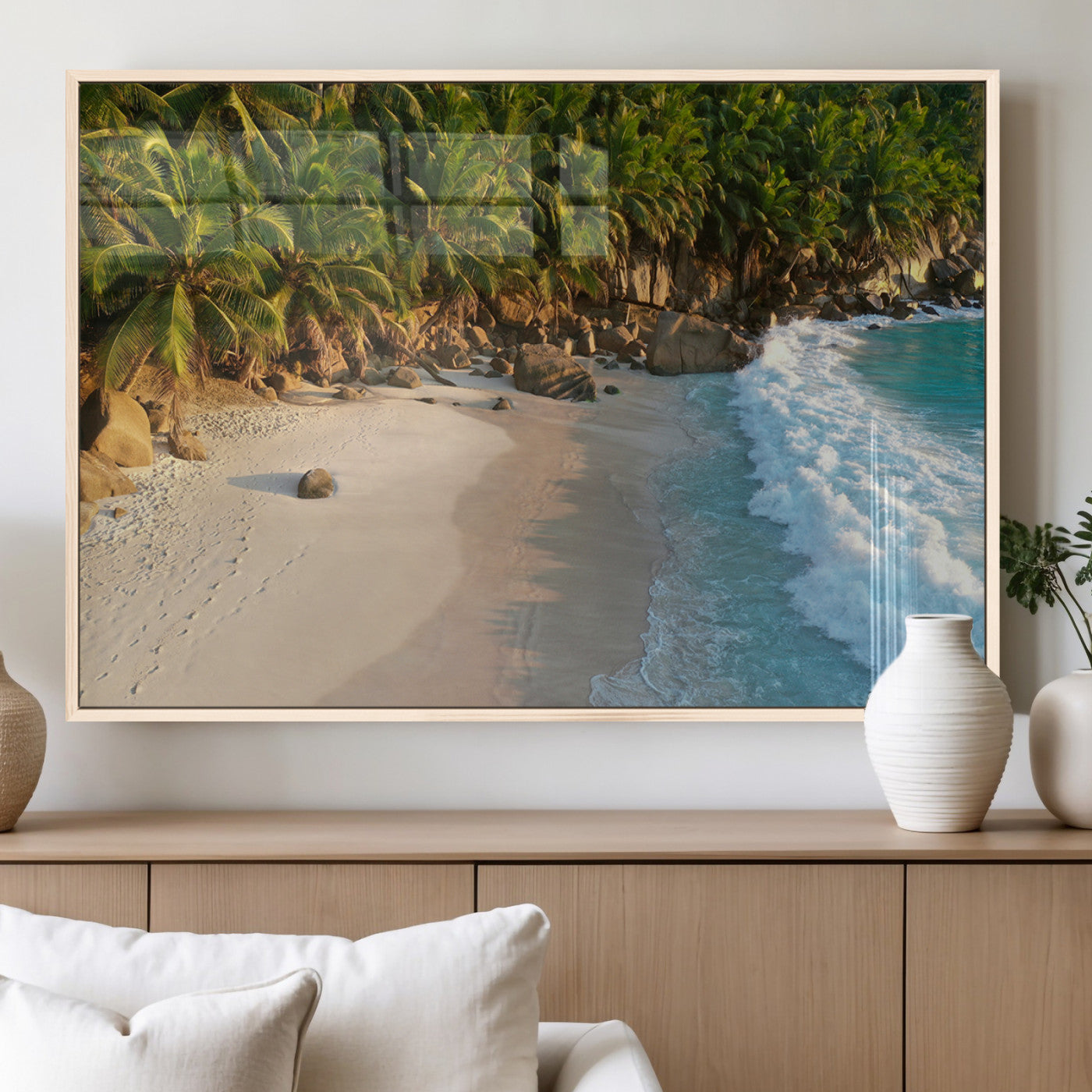 Tropical beach with golden sand, turquoise ocean waves, and lush palm trees, creating a serene coastal paradise for beach-themed decor.