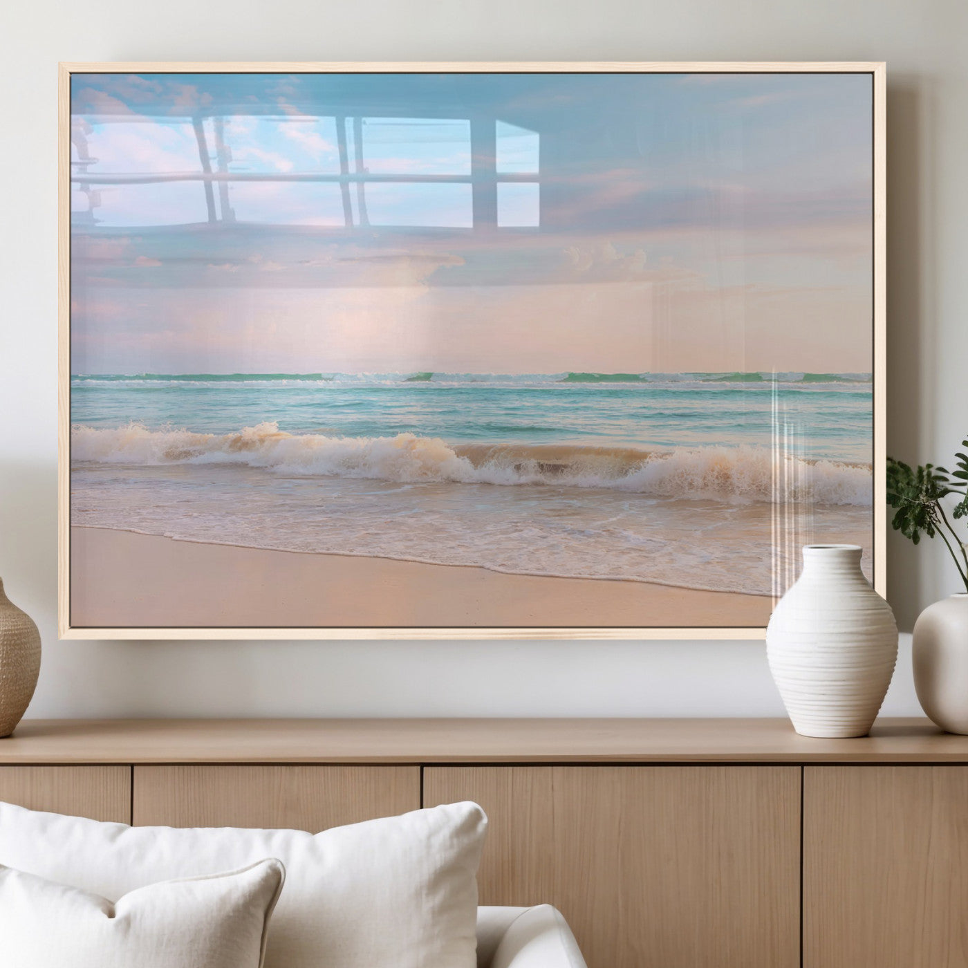 A peaceful beach scene with soft pastel skies, gentle waves washing up on the sandy shore, creating a calm and serene ocean view.