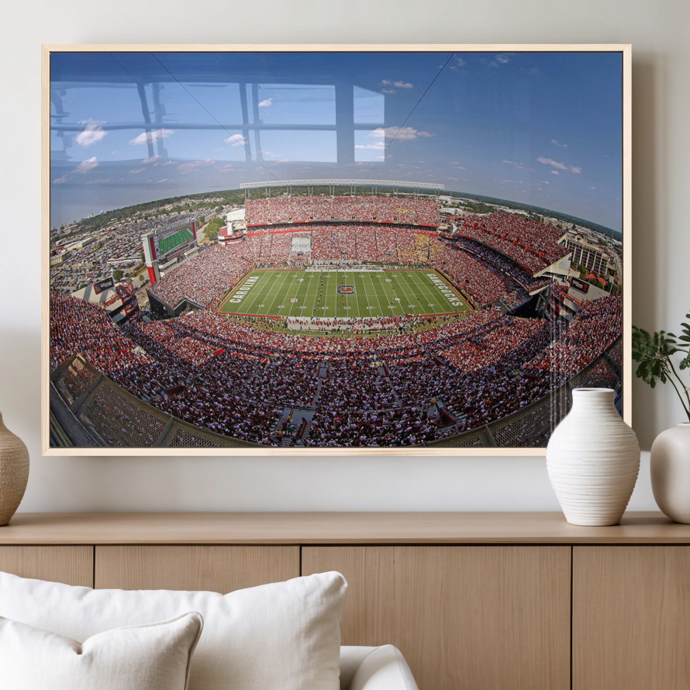 An William Brice-Stadium view of a full football stadium with cheering fans and clear blue skies, capturing the excitement and energy of the game.
