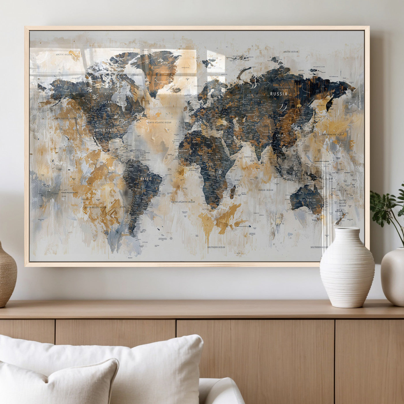 Artistic world map with textured brush strokes in shades of gold, navy blue, and white, showing continents and countries with an abstract, painterly effect.