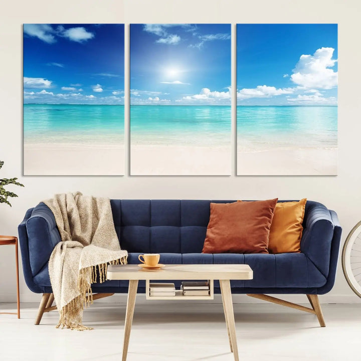 A contemporary living room showcasing the Wall Art Canvas Light Blue Beach and Ocean View.