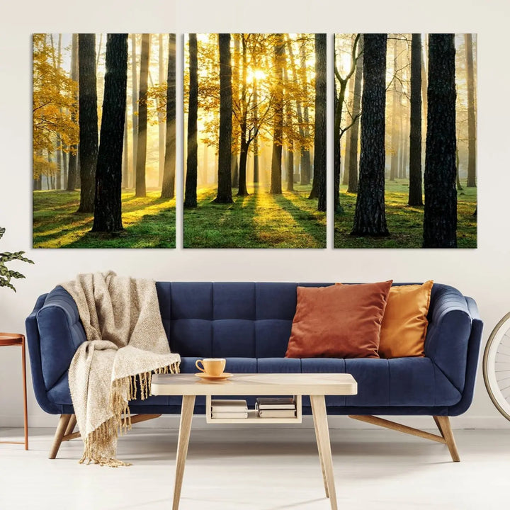 The living room is enhanced by the "Wall Art Landscape Canvas Print Tall Trees in Forest at Sunset" on museum-quality canvas. This triptych, complete with a UV-protective coating, is ready to hang and adds an artistic touch to the space.