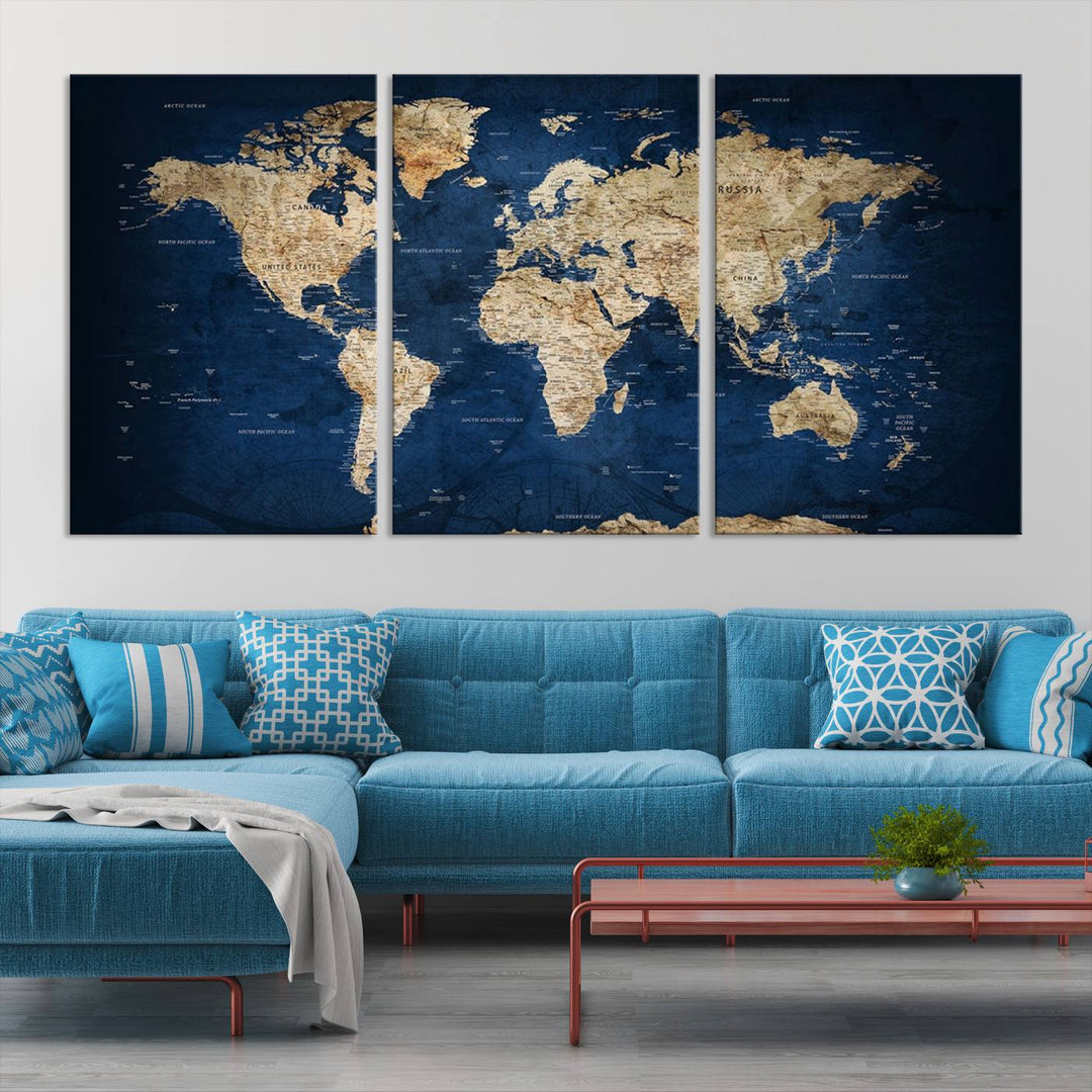 A triptych canvas print titled "Vintage Blue World Map Canvas Print - Classic World Map Design on Deep Blue Wall Art Print" adorns the wall, enhancing the decor with its antique style.