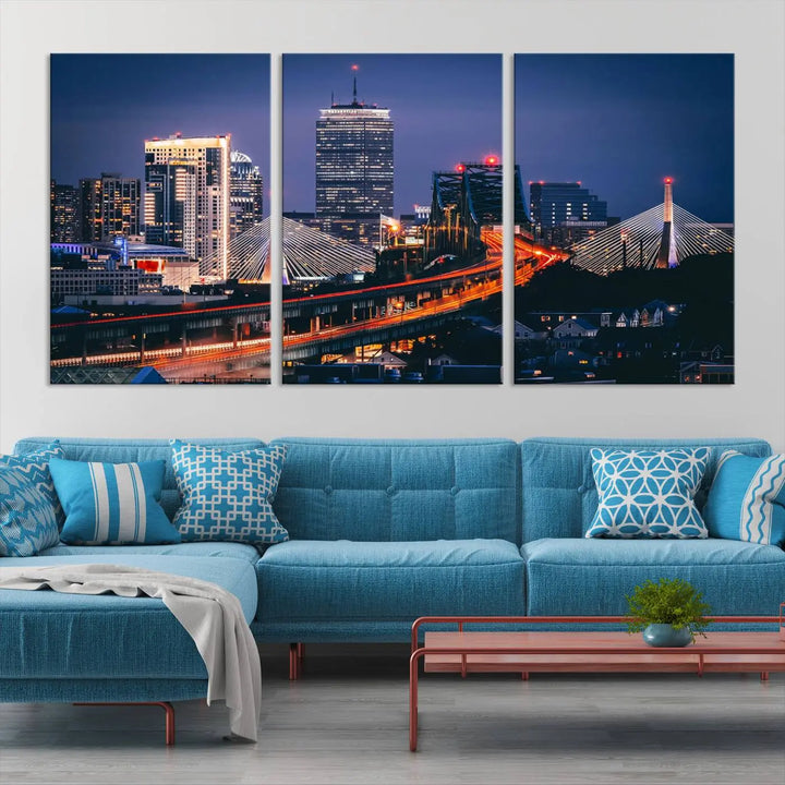 The "Boston City Lights Night Skyline Cityscape View" artwork on the wall showcases a brightly lit bridge at night. It is displayed on museum-quality canvas with a UV-protective coating.