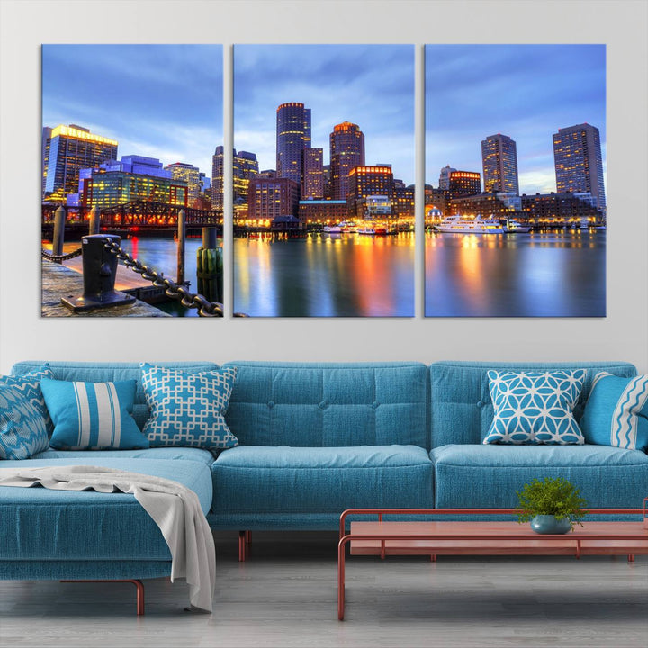 The Boston City Lights Sunset Cloudy Blue Skyline Cityscape View Wall Art Canvas Print embellishes a contemporary living room. This gallery-wrapped canvas set guarantees museum-quality canvases to enhance any space.