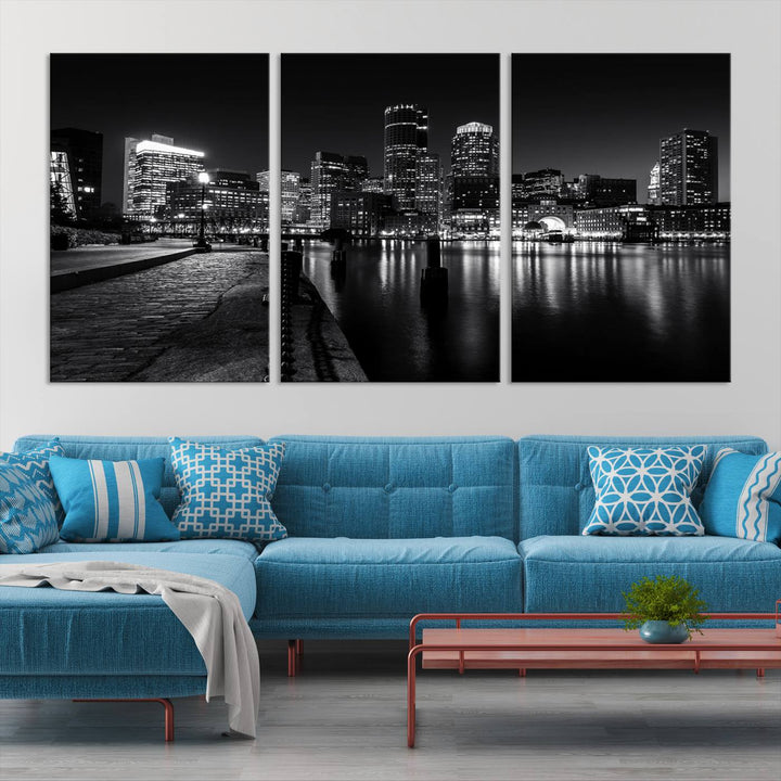 The Boston Lights Skyline Black and White Wall Art Cityscape Canvas Print, crafted with museum-quality canvas and UV-protective coating, serves as a striking triptych centerpiece in the living room.