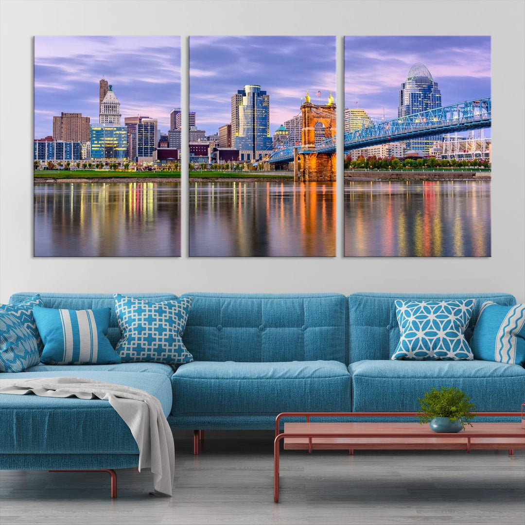 The wall art titled "Cincinnati City Lights Sunset Purple Cloudy Skyline Cityscape View" is beautifully printed on museum-quality canvases with a UV-protective coating and is ready to hang.