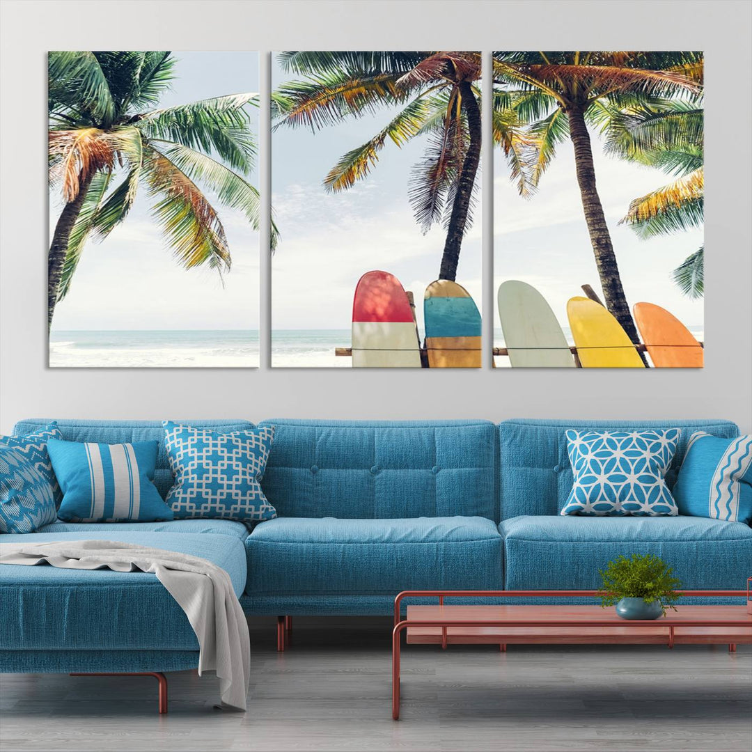 The room showcases The Palm and Surfing Board Wall Art Canvas Print, a triptych of palm trees and surfboards by the beach, elegantly gallery wrapped for a sophisticated finish.