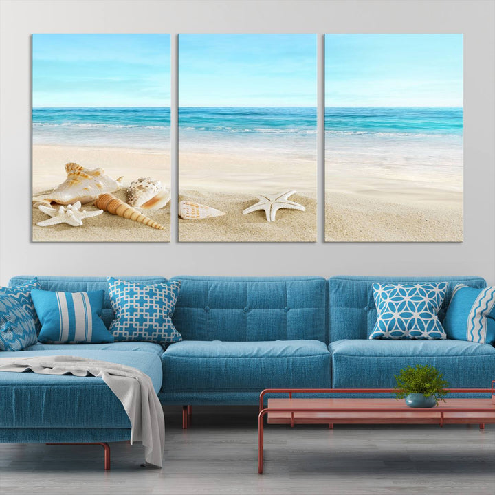 The "Turquoise Ocean View Seashell Starfish on the Beach Canvas Print Artwork" is a triptych piece that showcases a tranquil beach scene, complete with seashells and starfish adorning the sand. It is elegantly gallery-wrapped on museum-quality canvas.