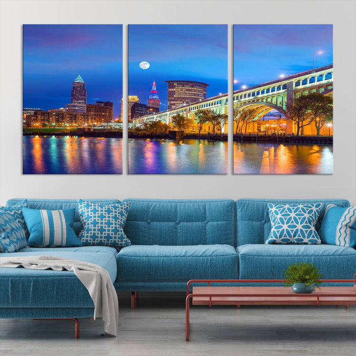 The Cleveland Night Skyline Wall Art City Cityscape Canvas Print portrays a city skyline and bridge lit up against the night sky. This artwork is printed on museum-quality canvas with a gallery-wrapped finish and features a UV-protective coating to ensure lasting vibrancy.