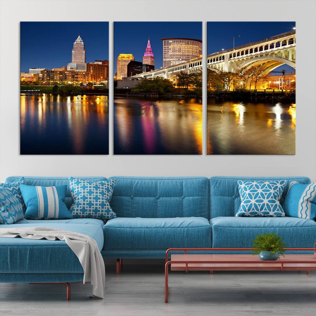 The "Cleveland Night Skyline Wall Art City Cityscape Canvas Print" is a striking feature in the room, showcasing a city skyline with a bridge reflecting in a river. Displayed on museum-quality canvas, it offers enduring beauty.