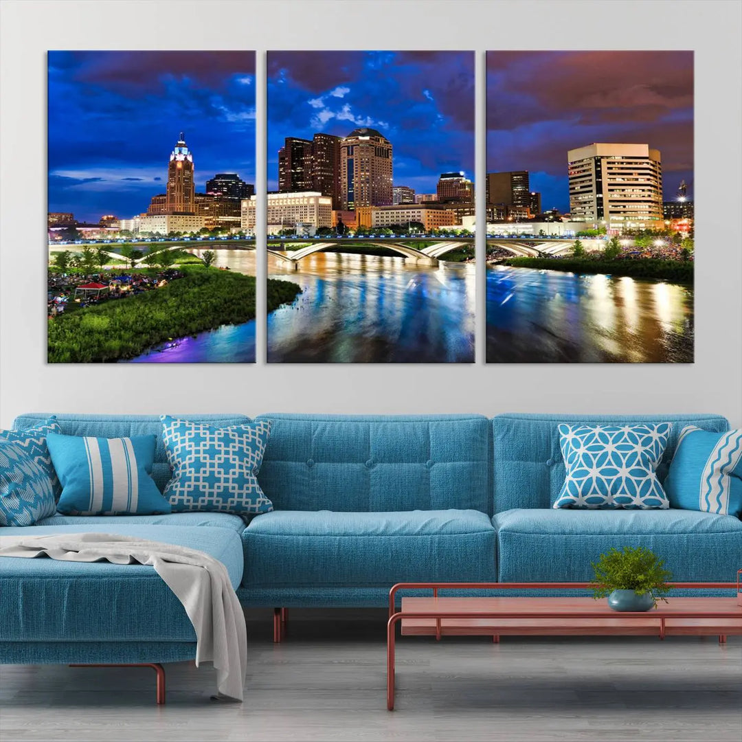 Columbus City Lights Night Bright Blue Cloudy Skyline Cityscape View Wall Art Canvas Print, gallery wrapped on museum-quality canvas, reflecting on a river.